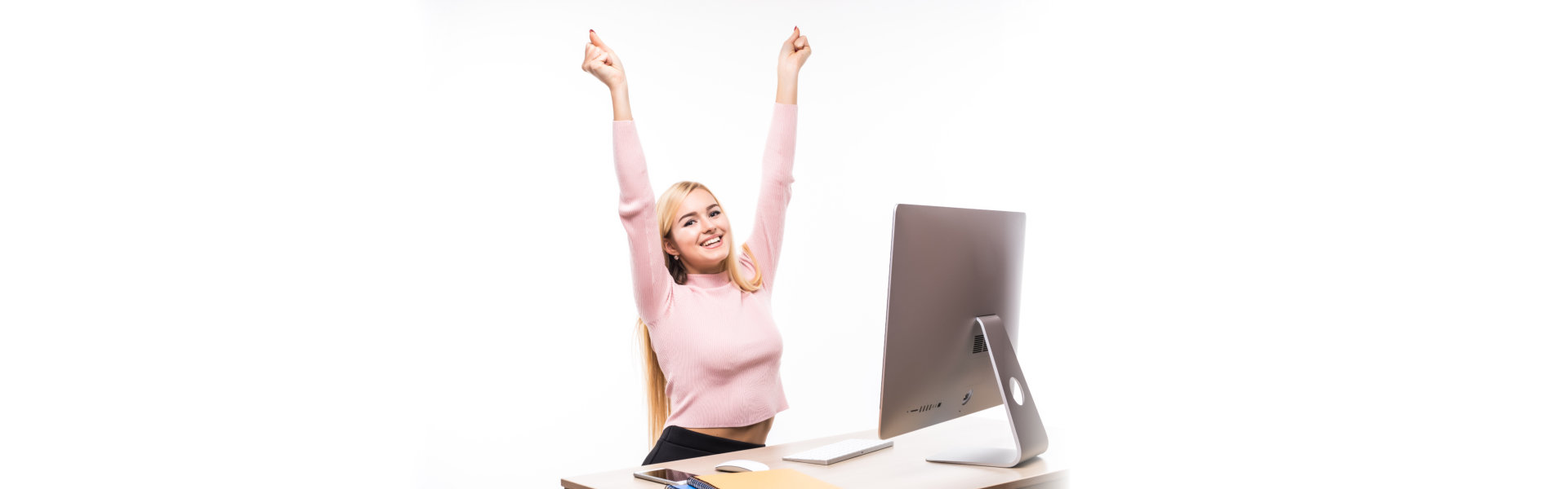 Happy woman while using computer